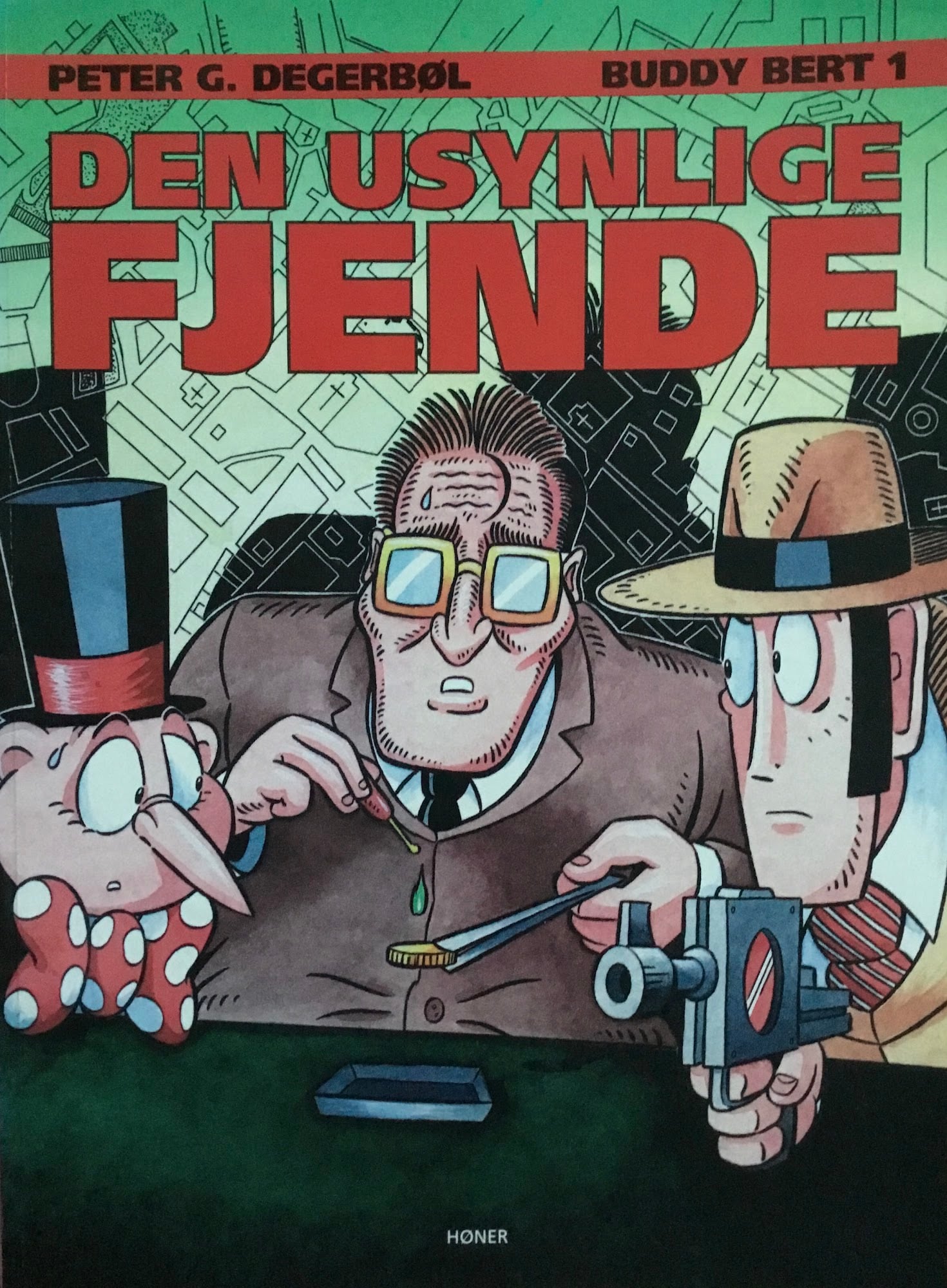 “Den usynlige fjende”: Buddy Bert album 1 (Forlaget Høner 2000).